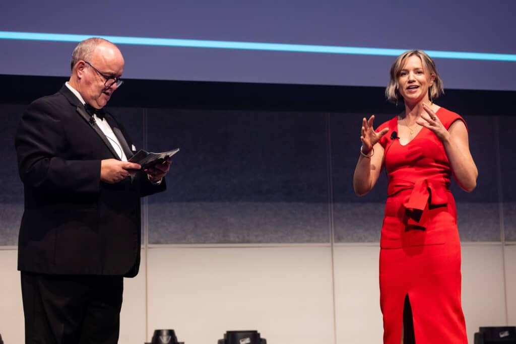 Mark Melvin, CEO of the Committee for Melbourne, Royal Flying Doctor Service Victoria, on stage with Marie Quirke, General Manager for Marketing and Fundraising.