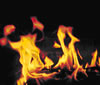 Flames against a dark sky
