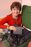 Women in red top demonstrates Dell IT kit