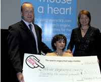 Nicole Dryburgh and a giant cheque from Every Click