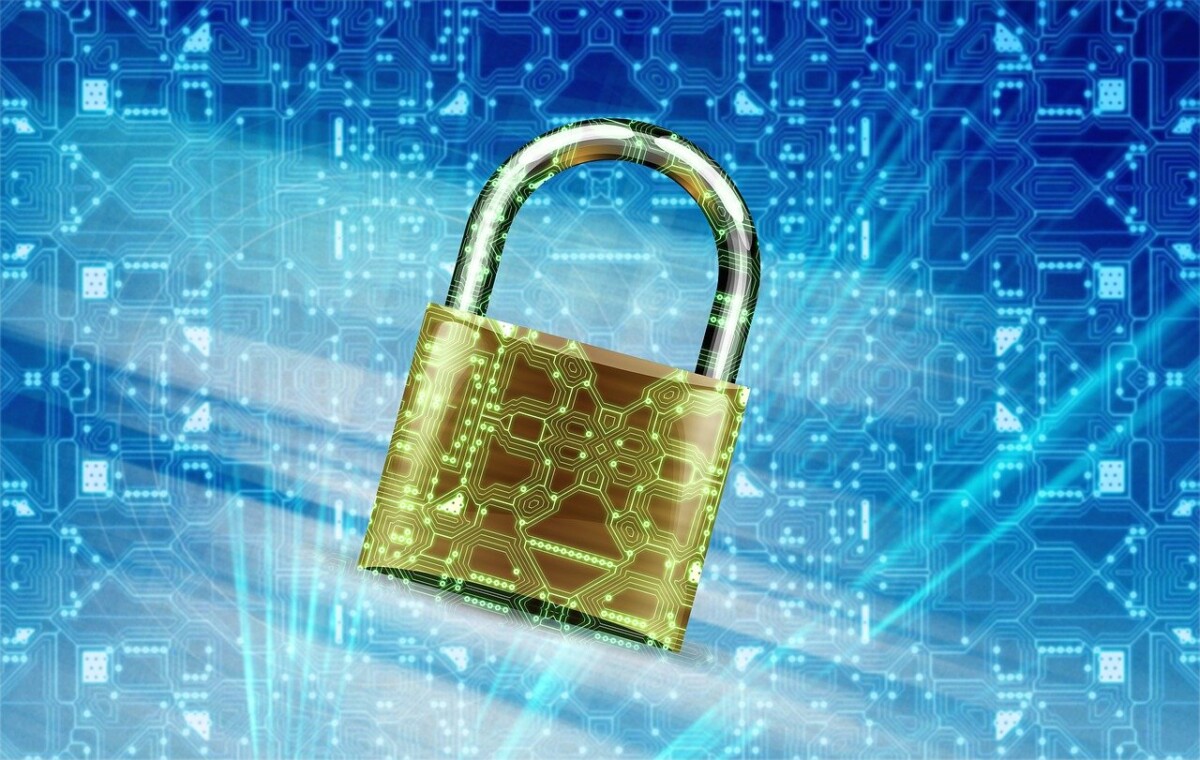 A locked padlock against a blue background depicting data. By Jan Alexander on Pixabay